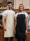 Photo of models wearing ‘Artisan’s Choice’ Double Pocket Canvas Apron in Natural & Black