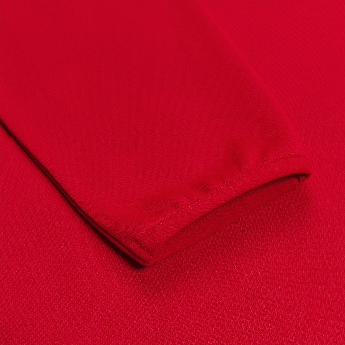 Photo of the Canterbury Womens Club 1/4 Zip Mid Layer Training Top in Red, close up of sleeve detail