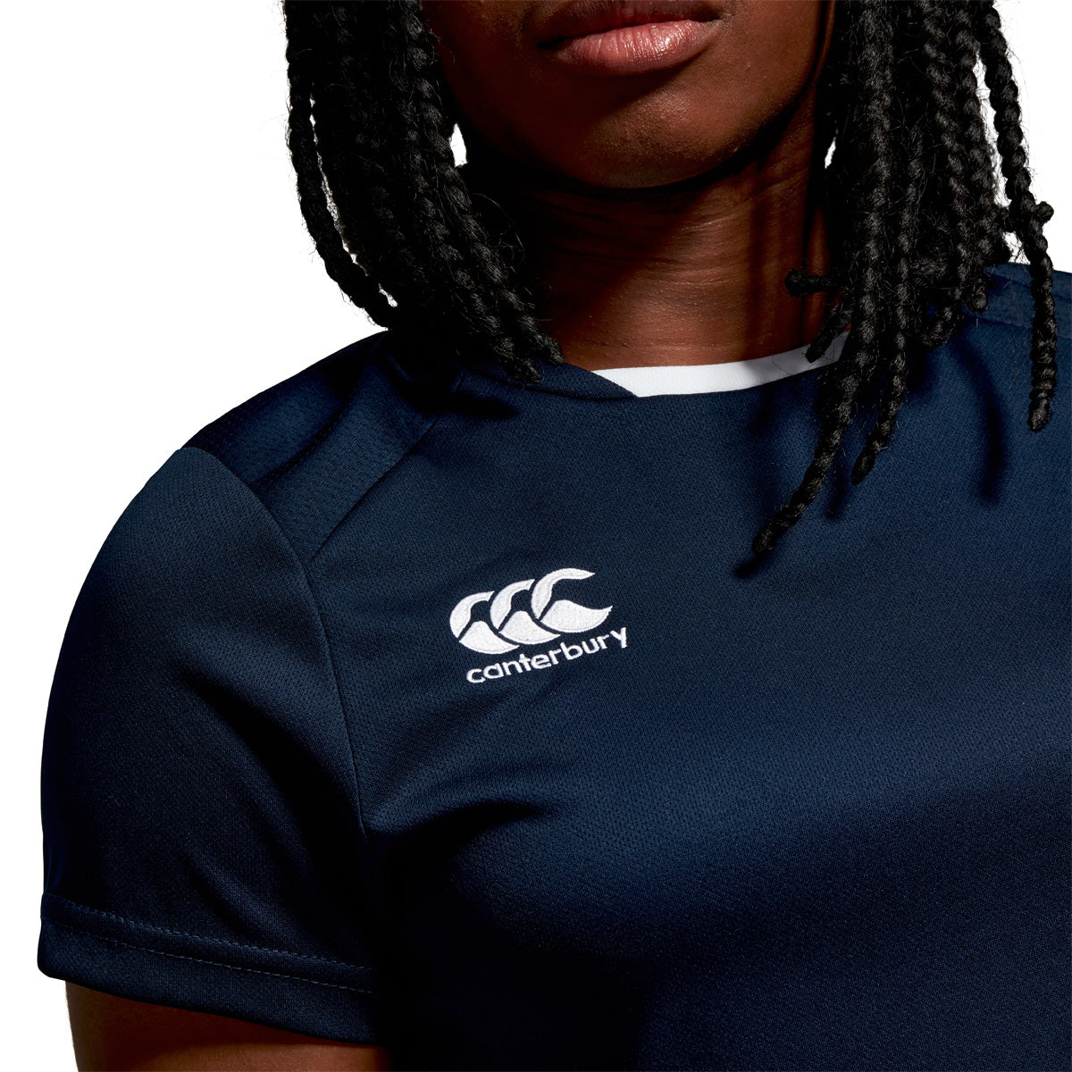 Model wearing Canterbury Club Dry Tee Female in Navy, front shoulder & neckline