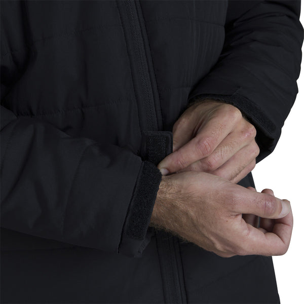 Close up of model highlighting sleeve cuff adjustment on theCanterbury Club Subs Jacket in Black