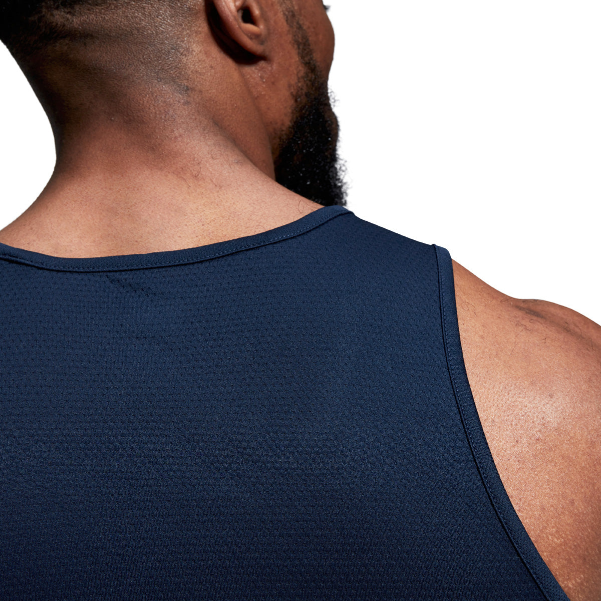 Rear shoulder photo of model wearing Canterbury Club Dry Singlet in Navy