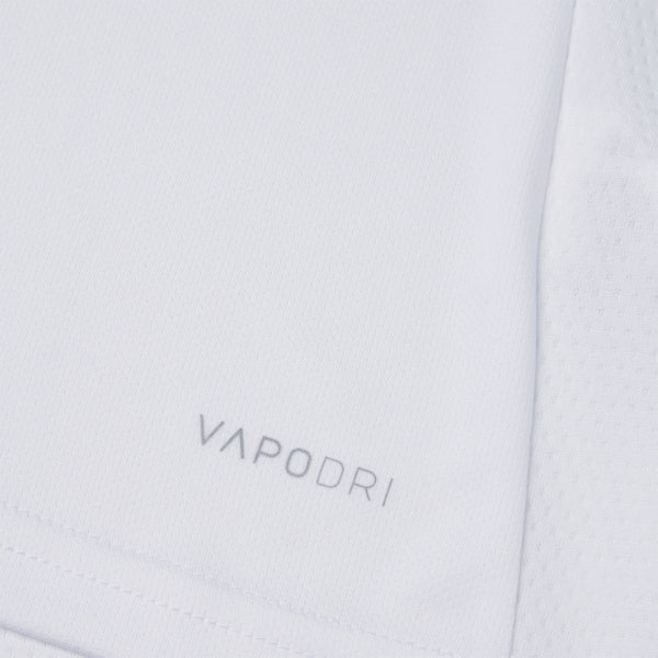 Photo of the Canterbury Club Dry Tee Junior in White, close up detail of VAPODRI logo