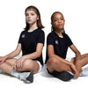 Photo of models wearing the Canterbury Club Dry Tee Junior in Black