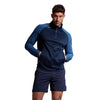 Photo of model wearing Canterbury Elite 1/4 Zip Top in Navy, front