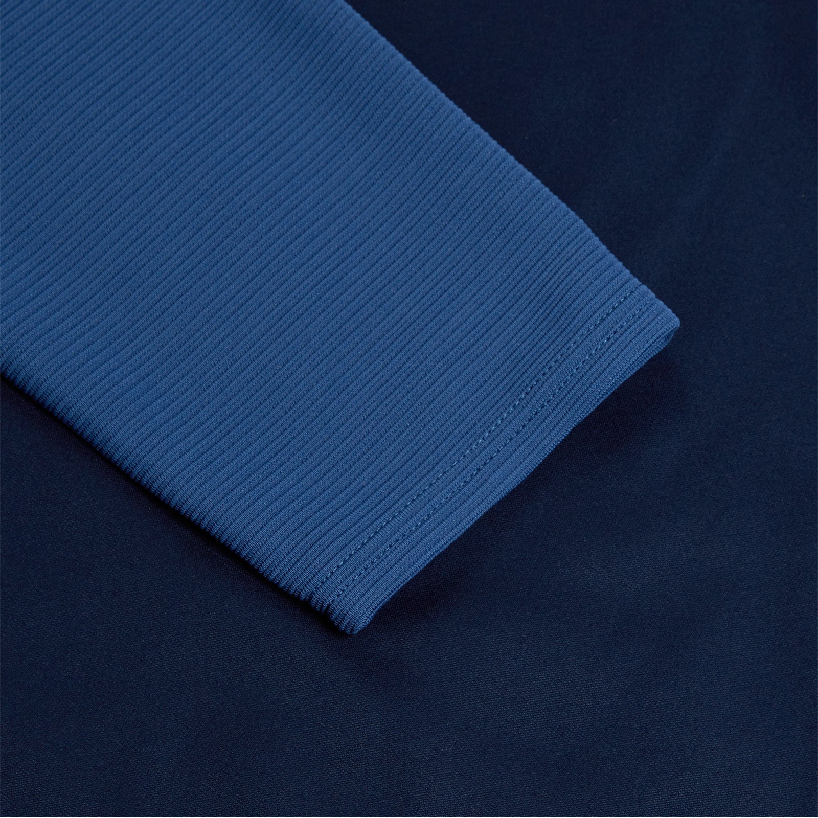 Canterbury Elite 1/4 Zip Top in Navy, ribbed sleeve detail
