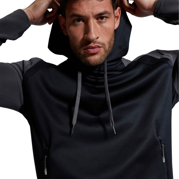 Photo of model wearing the Canterbury Elite Training Hoody Black, model pulling up hood