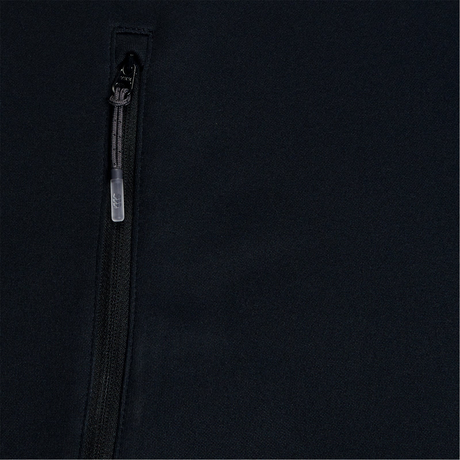 Photo of the Canterbury Elite Training Hoody Black, close up of pocket & zip detail