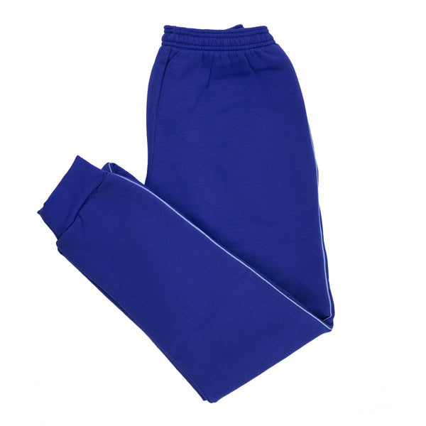 Our Lady's Grove Goatstown Tracksuit Bottom in Royal, with Sky Blue piping down the side of the leg.