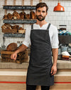 Model wearing the Cross Back 'Barista' Bib Apron