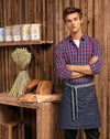 Model wearing the Division Waxed-Look Denim Waist Apron