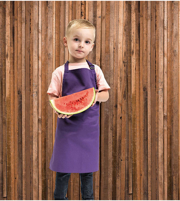 Child wearing the Children's Bib Apron