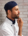 Chef wearing the Chef's Skull Cap