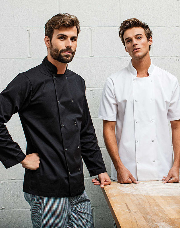 Chef wearing the Studded Front Short Sleeve Chef's jacket