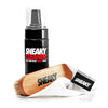 A picture of the Sneaky Cleaner set, showing Sneaker Cleaner bottle, brush and cloth