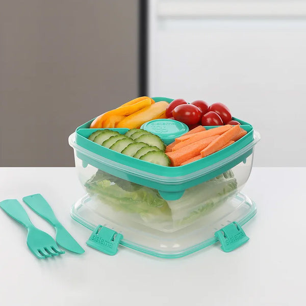 A photo of the Sistema 1.1L Salad TO GO in colour green, with lid open and salad food shot.