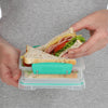 A lifestyle photo of the Sistema 450ml Sandwich Box TO GO in colour clear.