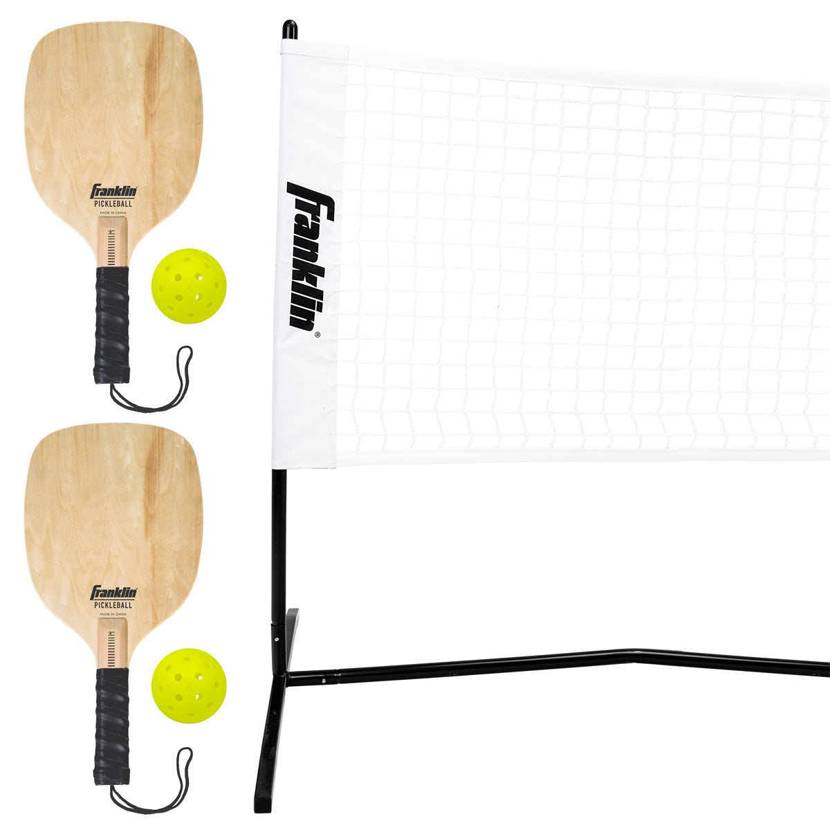 A photo showing the Franklin Pickleball 2 Player Court Net showing the contents of the set, the net, 2 paddels & 2 balls