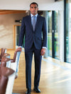 Model wearing Brook Taverner Cassino Slim Fit Jacket in Navy