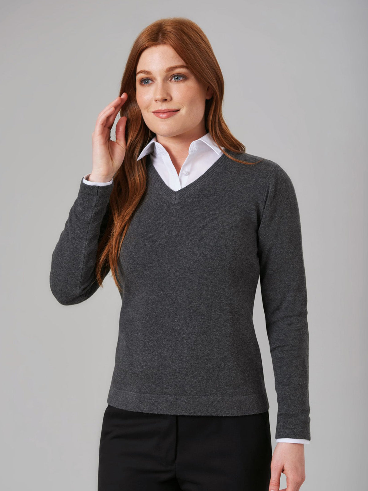 Model wearing Brook Taverner Atlanta V-neck Jumper in Charcoal