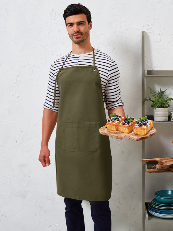 Photo of models wearing ‘Artisan’s Choice’ Double Pocket Canvas Apron in Olive