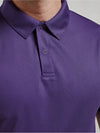 Close up photo of Coolchecker Studded Polo collar detail & fit