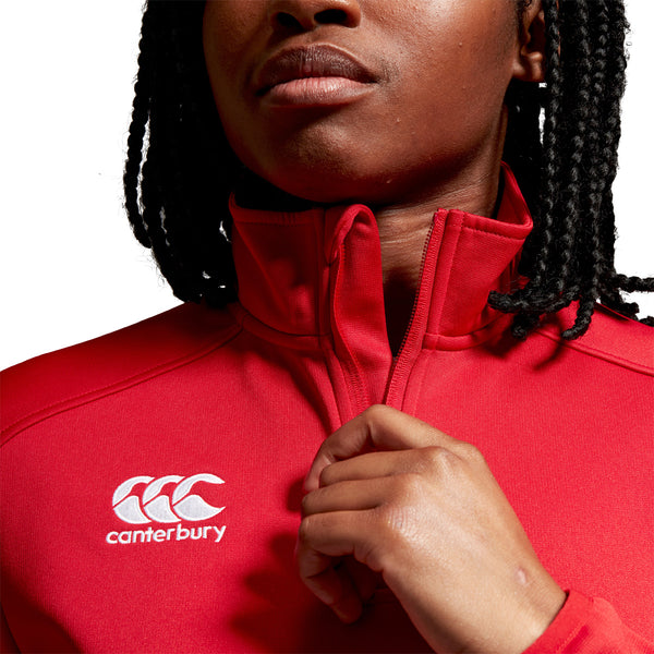 Photo of model wearing Canterbury Womens Club 1/4 Zip Mid Layer Training Top in Red, close up neck & shoulder detail