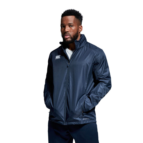 A photo of a model wearing the Canterbury Club Vaposhield Full Zip Rain Jacket in Navy, front view