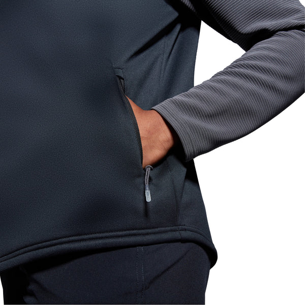 Photo of model wearing Canterbury Ladies Elite 1/4 Zip Top highlighting zip pocket detail