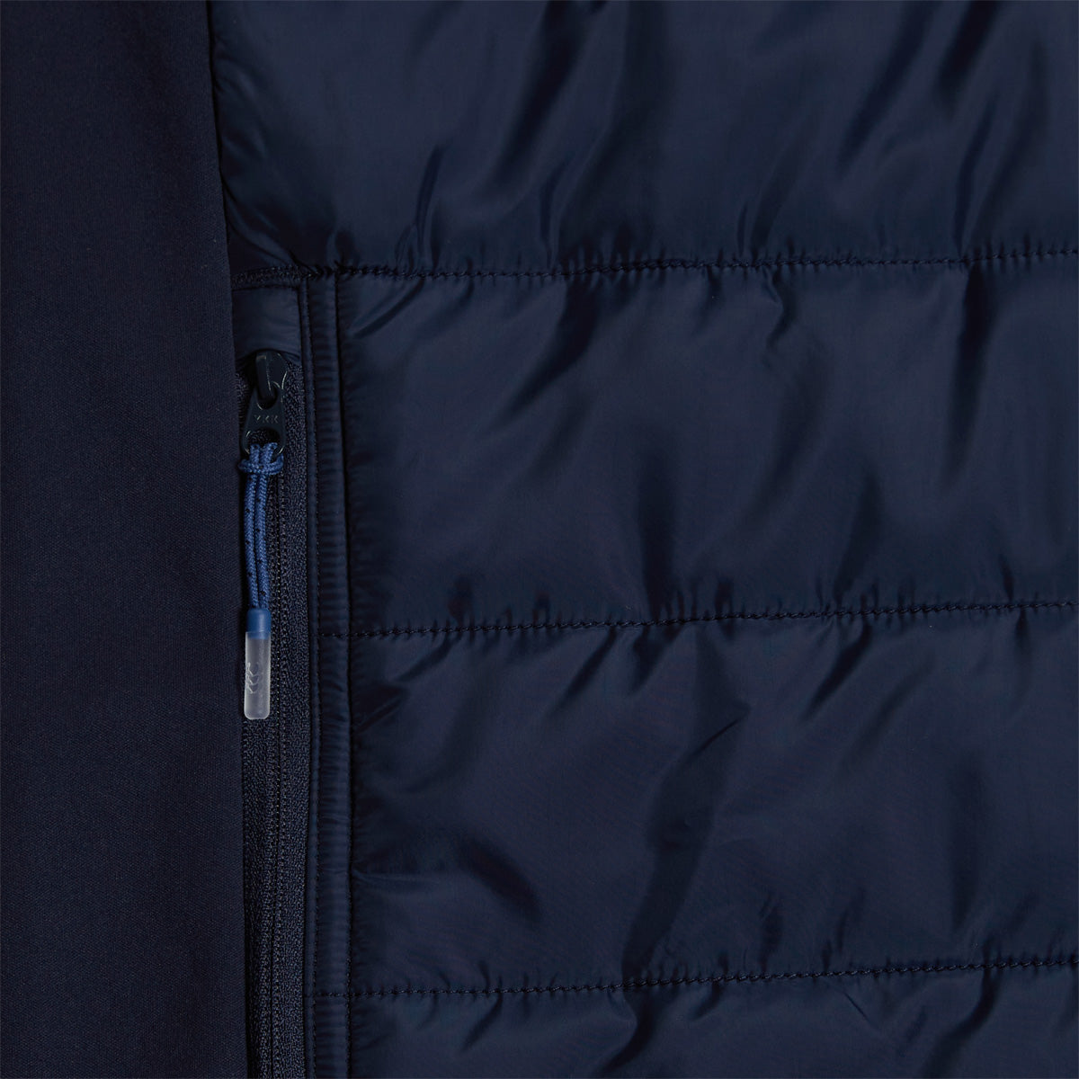 A photo of the Canterbury Elite Microlight Gilet Navy, close up of pocket detail