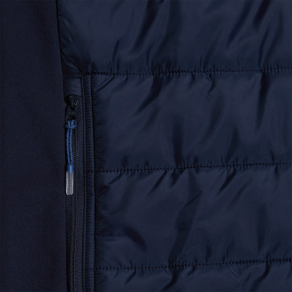 A photo of the Canterbury Elite Microlight Gilet Navy, close up of pocket detail