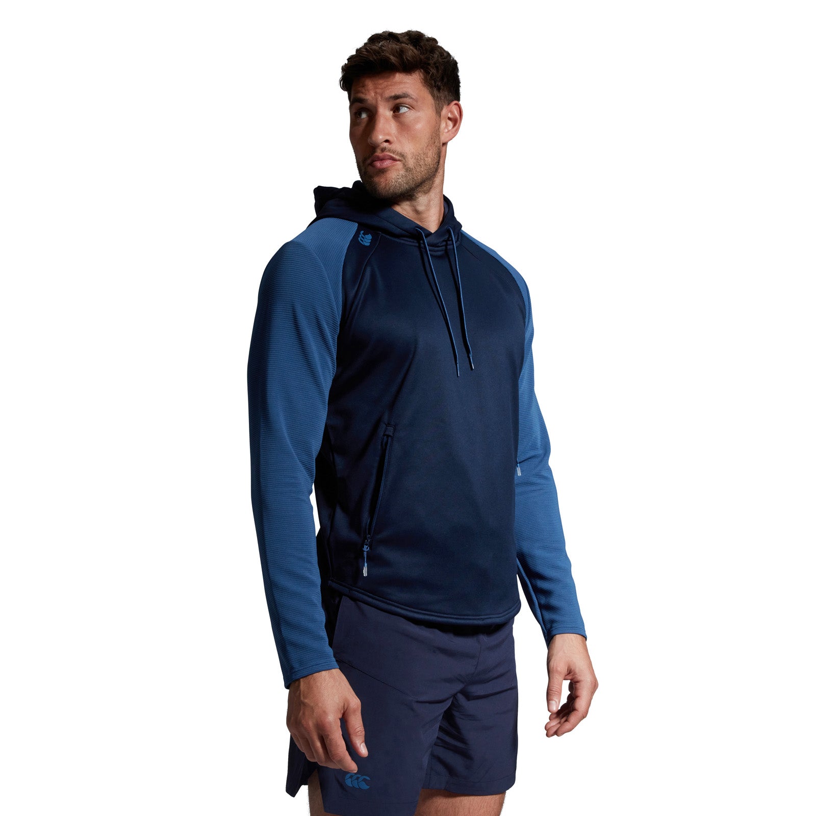 Photo of model wearing the Canterbury Elite Training Hoody Navy, side view