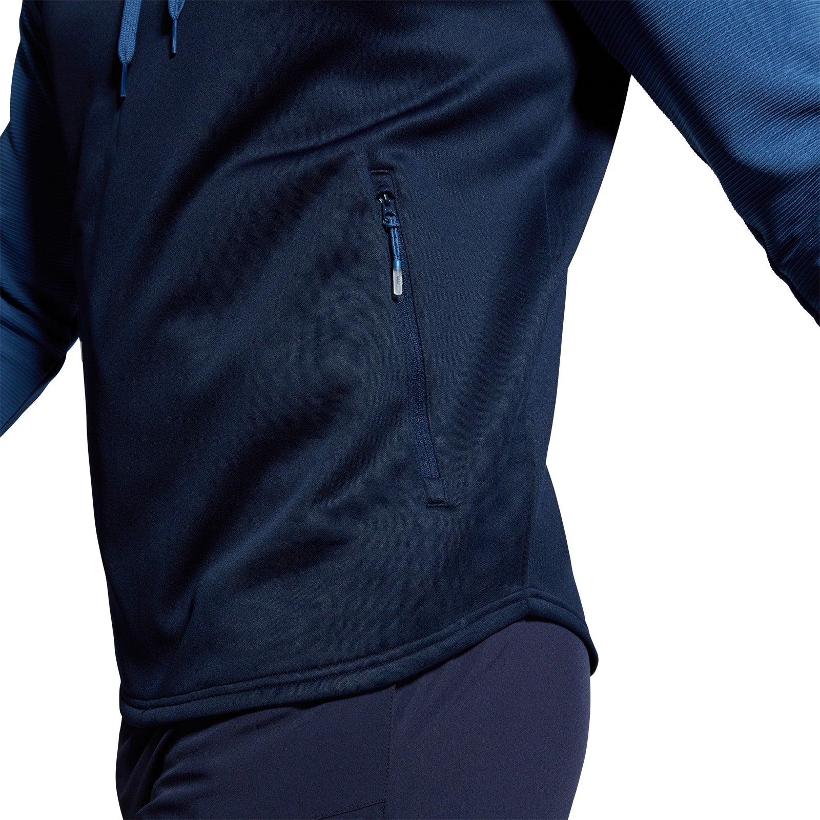 Photo of model wearing the Canterbury Elite Training Hoody Navy, waist and hip detail