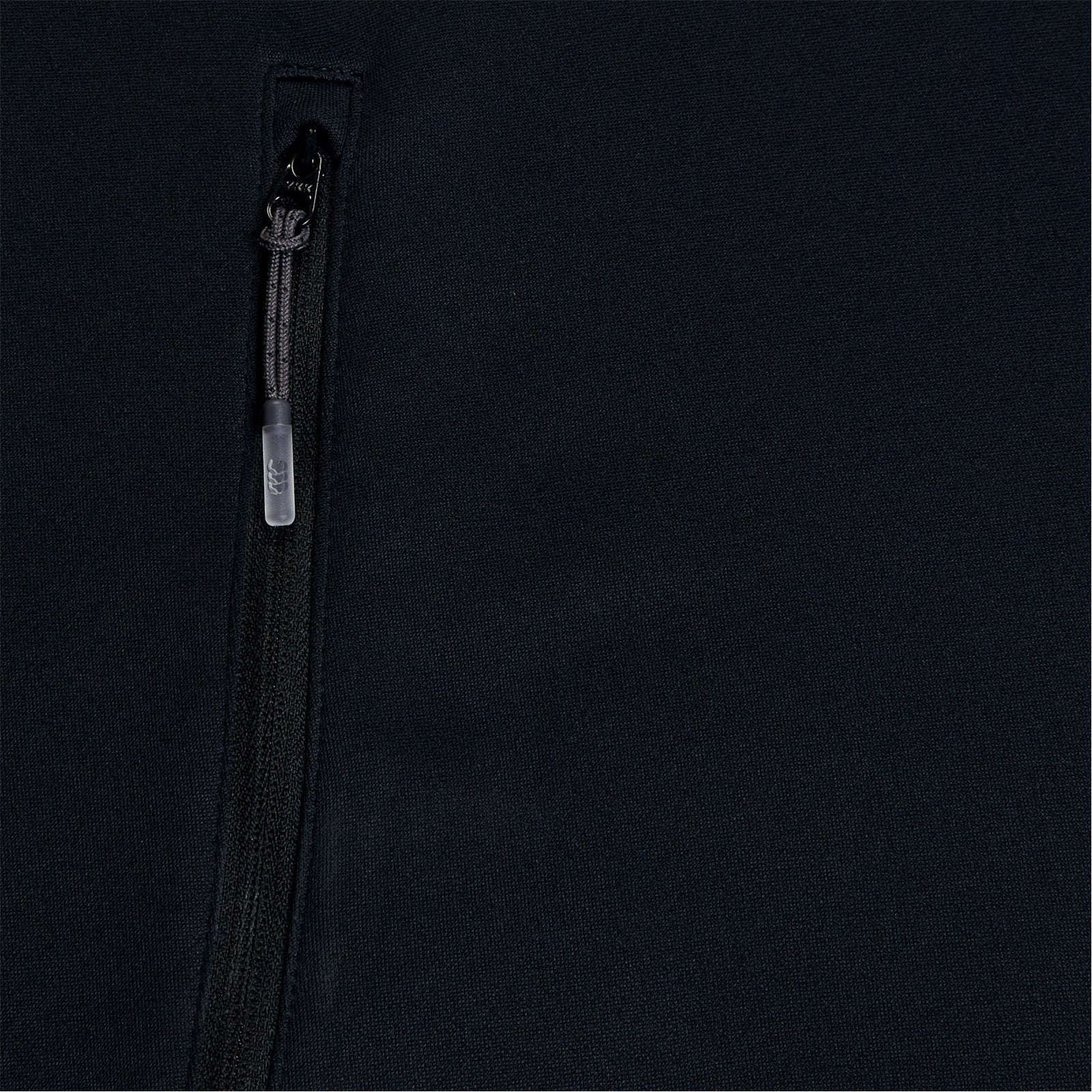 Photo of the Canterbury Elite Training Hoody Black, close up of pocket & zip detail