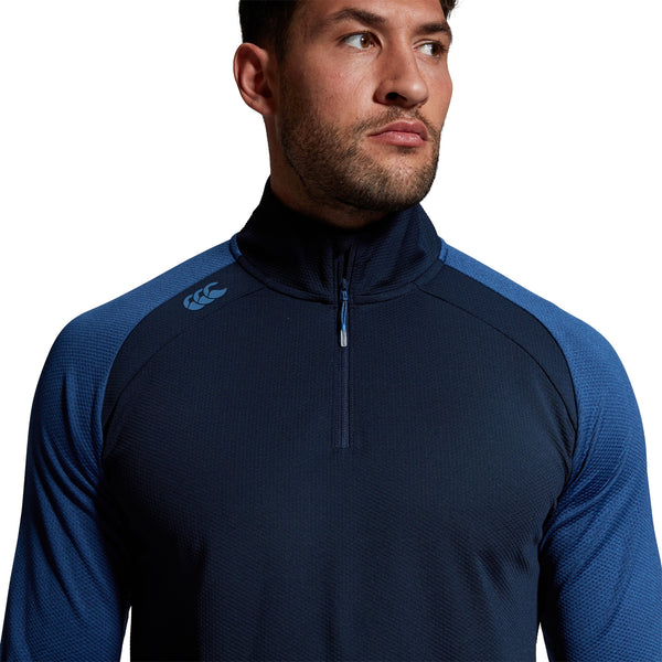 Photo of model wearing Canterbury Mens Elite First Layer in Navy, close up shoulder & chest detail