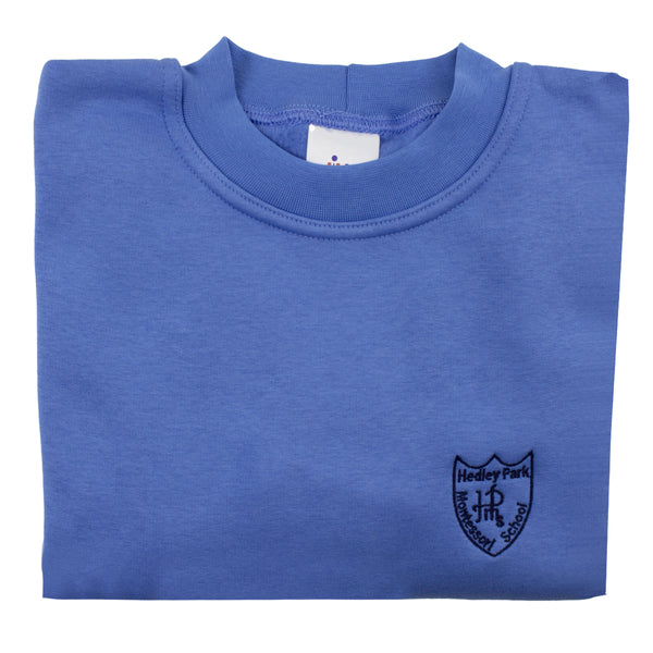 A photo of the Hedley Park Sweatshirt in Sky with embroidered Hedley School crest