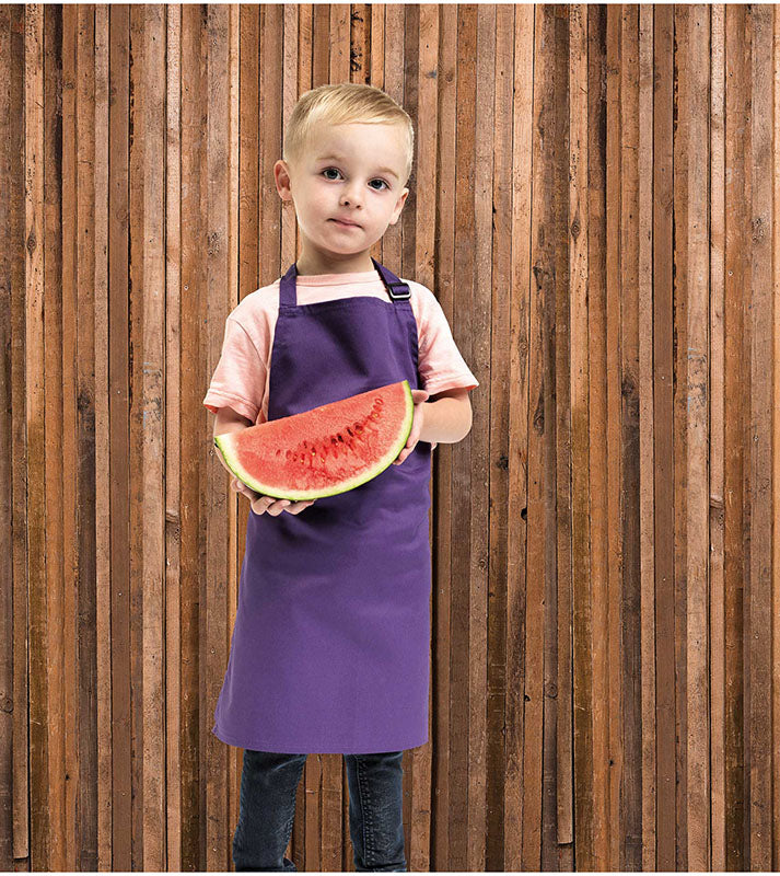 Child wearing the Children's Bib Apron