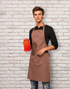 Model wearing the Colours Bib Apron with Pocket