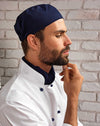 Chef wearing the Chef's Skull Cap